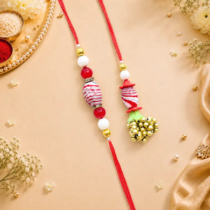 Pair Rakhi - Red Flower and White Beads Golden Bunch