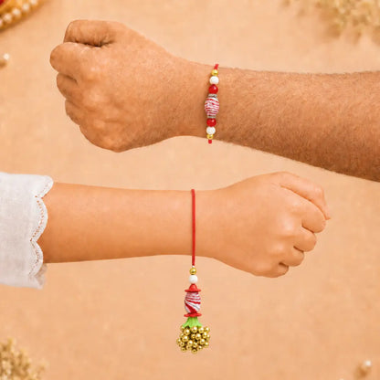 Pair Rakhi - Red Flower and White Beads Golden Bunch