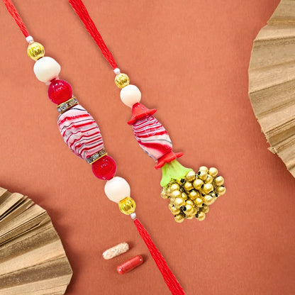 Pair Rakhi - Red Flower and White Beads Golden Bunch