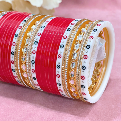 Regally Crimson - Kundan & Pearl Chooda Ensembles