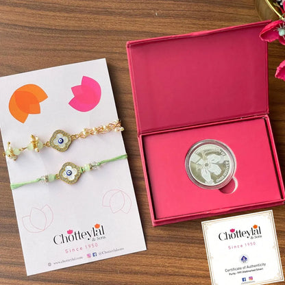 Combo: Happy Rakhi Gift - Rakhi On Hand Coin (10 Gram) + 2 Rakhi - 999 Purity Silver Coin