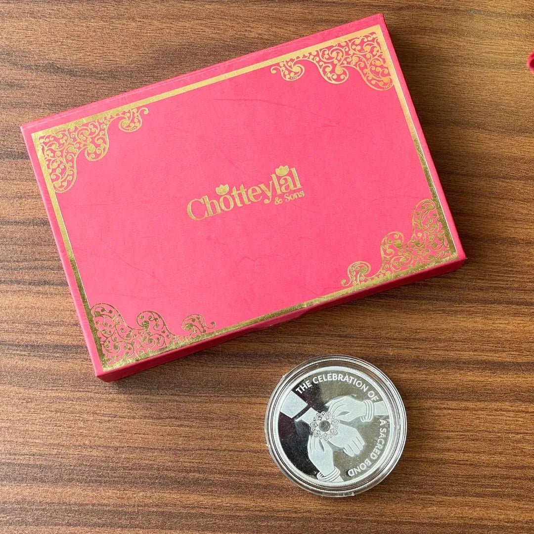 Combo: Happy Rakhi Gift - Rakhi On Hand Coin (10 Gram) + 2 Rakhi - 999 Purity Silver Coin