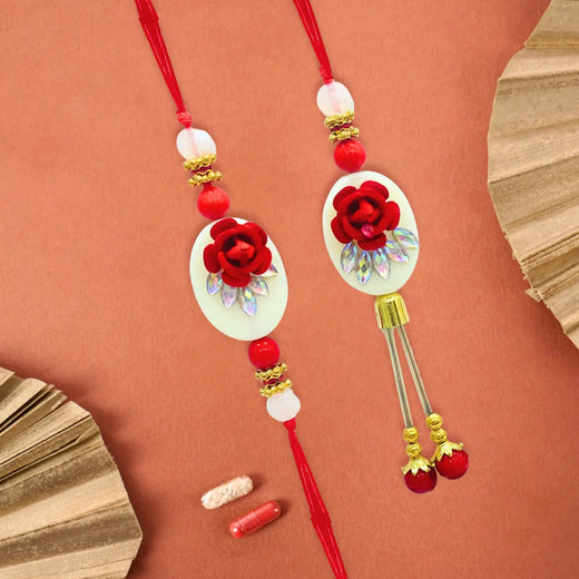 Red Flower & White Beads Bhaiya-Bhabhi Rakhi Set – Elegant Festive Design