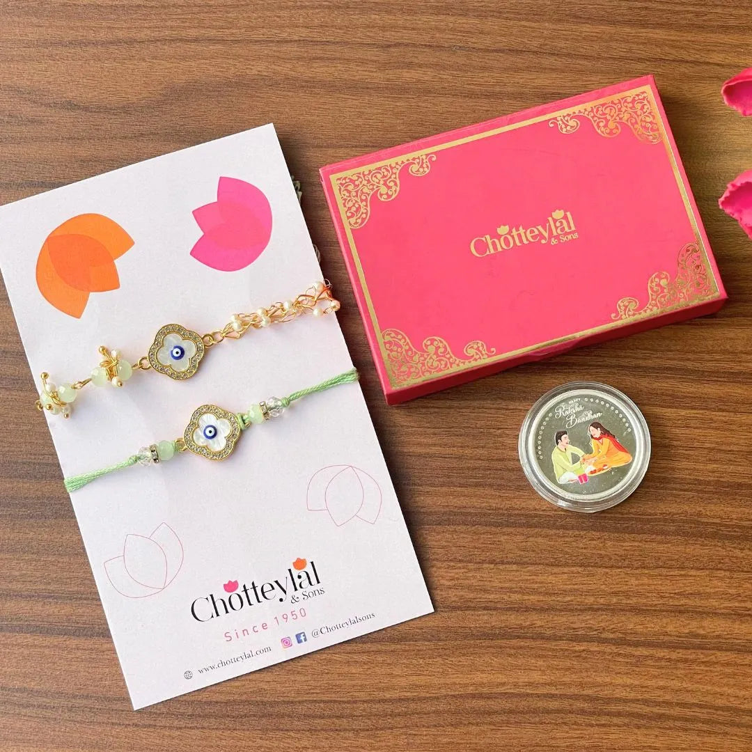 Combo: Happy Rakhi Gift - Brother Sister Coin (10 Gram) + 2 Rakhi - 999 Purity Silver Coin