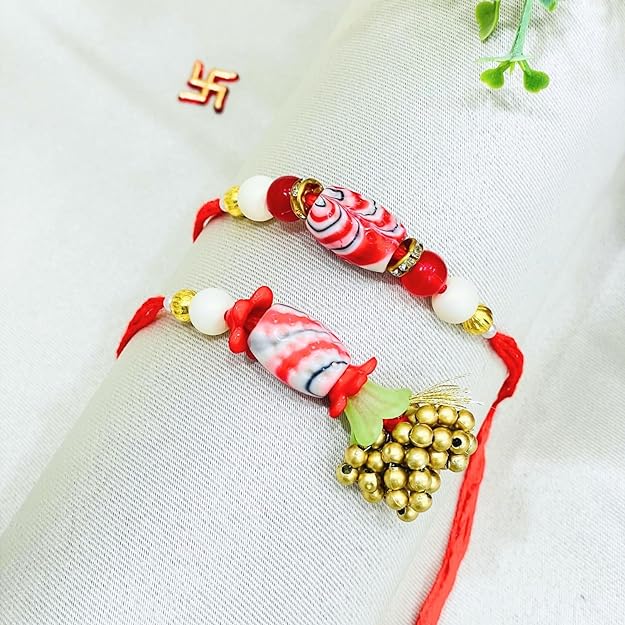 Pair Rakhi - Red Flower and White Beads Golden Bunch