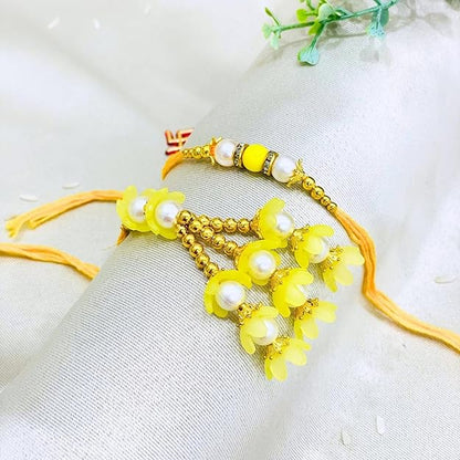 Pair Rakhi - Beautiful Yellow Flower Design