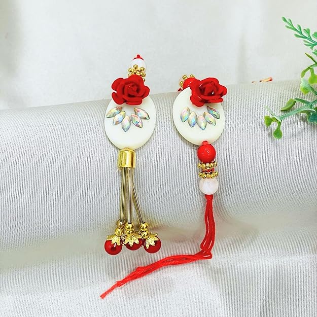 Pair Rakhi - Red Flower and White Beads Design