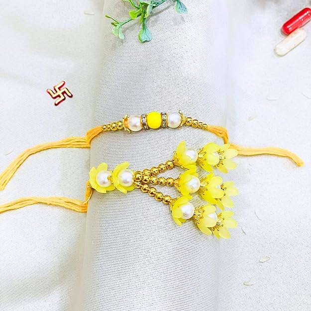 Pair Rakhi - Beautiful Yellow Flower Design