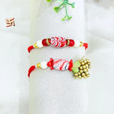 Pair Rakhi - Red Flower and White Beads Golden Bunch