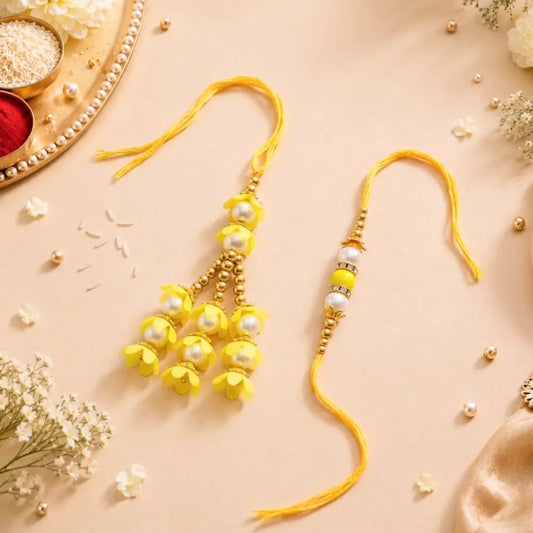 Pair Rakhi - Beautiful Yellow Flower Design