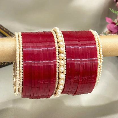 Punjabi Deep Red Chuda Design With Pearl Bangles