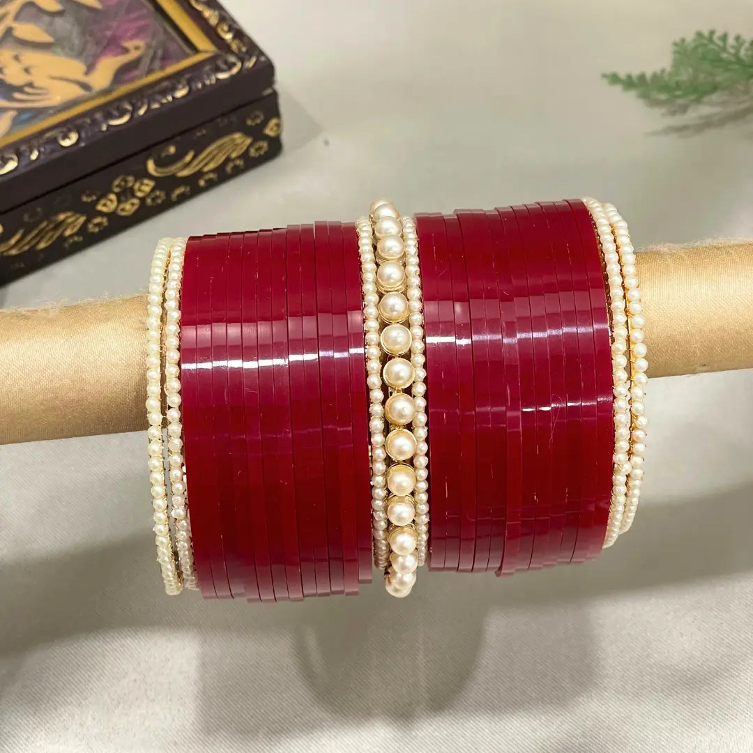 Punjabi Deep Red Chuda Design With Pearl Bangles Chotteylal sons