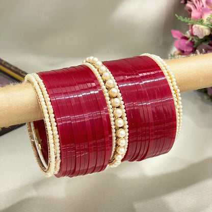 Punjabi Deep Red Chuda Design With Pearl Bangles