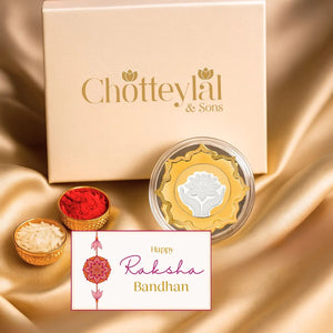 Lotus in Hand Rakhi Gift – Lotus-Shaped 25g Silver Coin